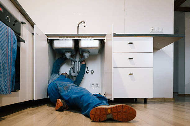 Professional Emergency Plumber technician working in Granger, IA